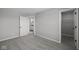Bedroom featuring neutral walls, soft carpet, and a door leading to the bathroom at 4180 Bozeman Way, Bargersville, IN 46106