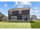 A two-story home with sod and a patio at 4180 Bozeman Way, Bargersville, IN 46106