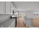 Beautiful kitchen with stainless steel appliances, a large island, and a view to the living room and back yard at 4180 Bozeman Way, Bargersville, IN 46106