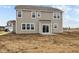 Rear exterior view of home with large windows and siding at 4186 Dutton Dr, Bargersville, IN 46106