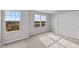 Bedroom featuring neutral carpet, grey walls, a window, and a closet with sliding doors at 4186 Dutton Dr, Bargersville, IN 46106