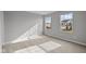 Sunlit bedroom with two windows offering neighborhood views at 4186 Dutton Dr, Bargersville, IN 46106
