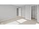 Spacious bedroom with neutral carpet, grey walls, and multiple doorways leading to other areas at 4186 Dutton Dr, Bargersville, IN 46106