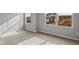 Bedroom with neutral carpet, two windows providing natural light and scenic neighborhood views at 4186 Dutton Dr, Bargersville, IN 46106