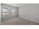 This bright bedroom has neutral paint and carpet, plus two windows letting in the sunlight at 4193 Bozeman Way, Bargersville, IN 46106