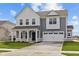 Charming two-story home features a two-car garage, covered porch, and well-manicured lawn at 4193 Bozeman Way, Bargersville, IN 46106