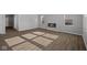 Bright living room with wood floors, modern fireplace, and lots of natural light at 4193 Bozeman Way, Bargersville, IN 46106