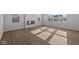 Bright living room with wood floors, modern fireplace, and lots of natural light at 4193 Bozeman Way, Bargersville, IN 46106