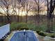 An in-ground pool is covered for the winter in a beautiful, fenced backyard at 6902 Creekridge Trl, Indianapolis, IN 46256