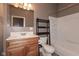 Bathroom boasts a vanity with sink, toilet, and a shower/tub combo at 741 Greer St, Indianapolis, IN 46203