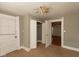 Bright bedroom with ceiling fan, closet and neutral color palette at 741 Greer St, Indianapolis, IN 46203