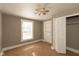 Cozy bedroom featuring a ceiling fan, closet, window and neutral color palette at 741 Greer St, Indianapolis, IN 46203