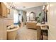 Stylish bathroom with a soaking tub, double vanity, and elegant fixtures at 7258 N Richardson Dr, Morgantown, IN 46160