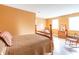 Spacious bedroom with hardwood floors, large windows, and warm, inviting decor at 7258 N Richardson Dr, Morgantown, IN 46160