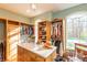 Spacious walk-in closet with custom shelving and ample storage space and natural light at 7258 N Richardson Dr, Morgantown, IN 46160