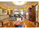 Well-lit kitchen with custom cabinets, stainless steel appliances, and a large center island with seating at 7258 N Richardson Dr, Morgantown, IN 46160