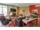 Cozy living room features a stone fireplace, comfortable seating and wood floors at 7258 N Richardson Dr, Morgantown, IN 46160