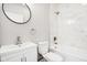 Bathroom with marble tile and modern vanity at 2018 Rembrandt St, Indianapolis, IN 46202