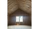 Spacious room under construction, framed by a high-pitched ceiling and natural light at 2018 Rembrandt St, Indianapolis, IN 46202