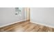 Spacious bedroom with hardwood floors and neutral colored walls at 2018 Rembrandt St, Indianapolis, IN 46202