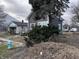 Newly renovated gray home with deck and large tree at 2018 Rembrandt St, Indianapolis, IN 46202