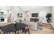 Open living and dining area with a modern sectional sofa at 2018 Rembrandt St, Indianapolis, IN 46202