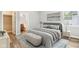 Main bedroom with ensuite bathroom and plush bedding at 2018 Rembrandt St, Indianapolis, IN 46202