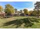 Large grassy backyard with a view of neighboring homes at 4902 N Park Ave, Indianapolis, IN 46205