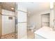 Updated bathroom with walk-in shower and modern vanity at 4902 N Park Ave, Indianapolis, IN 46205