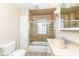 Clean bathroom with shower/tub combo and tile at 4902 N Park Ave, Indianapolis, IN 46205