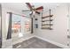 Charming bedroom with built-in shelving and a large window at 4902 N Park Ave, Indianapolis, IN 46205