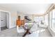 Large bonus room with a play table and seating, great for entertainment and relaxation at 4902 N Park Ave, Indianapolis, IN 46205