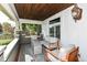 Covered porch with seating and a view of the street at 4902 N Park Ave, Indianapolis, IN 46205