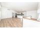 Open concept kitchen with island and stainless steel appliances at 4902 N Park Ave, Indianapolis, IN 46205