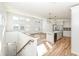 Open concept kitchen with island and stainless steel appliances at 4902 N Park Ave, Indianapolis, IN 46205