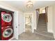 Laundry room with stackable washer and dryer at 4902 N Park Ave, Indianapolis, IN 46205