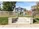 Steps leading to the backyard with a fence and gate at 4902 N Park Ave, Indianapolis, IN 46205