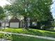 Appealing home with a well-manicured lawn, mature trees, and a classic brick facade at 534 Austrian Way, Avon, IN 46123