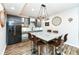 Basement bar area with granite countertop and seating at 6252 Sugar Maple Dr, Zionsville, IN 46077