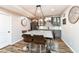 Basement bar area with granite countertop and seating at 6252 Sugar Maple Dr, Zionsville, IN 46077