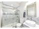 Updated bathroom with walk-in shower, modern vanity, and stylish tile at 6252 Sugar Maple Dr, Zionsville, IN 46077