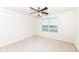 Simple bedroom with a ceiling fan and window at 6252 Sugar Maple Dr, Zionsville, IN 46077