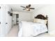 Comfortable bedroom with a queen-size bed and ceiling fan at 6252 Sugar Maple Dr, Zionsville, IN 46077