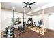 Basement home gym with various equipment at 6252 Sugar Maple Dr, Zionsville, IN 46077