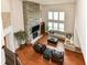 Two-story living room with hardwood floors, stone fireplace and high ceilings at 6252 Sugar Maple Dr, Zionsville, IN 46077