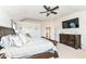 Spacious main bedroom with large bed, dresser, and ensuite bathroom access at 6252 Sugar Maple Dr, Zionsville, IN 46077
