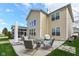 Large patio with fire pit and ample seating for outdoor entertaining at 6252 Sugar Maple Dr, Zionsville, IN 46077