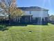 View of the property's backyard showing off a beautiful manicured green lawn at 794 Princeton Ln, Westfield, IN 46074
