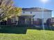 Backyard features a brick and siding home with a patio and an expansive lawn at 794 Princeton Ln, Westfield, IN 46074