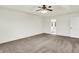 Cozy bedroom featuring a ceiling fan and a view to the ensuite bath at 794 Princeton Ln, Westfield, IN 46074
